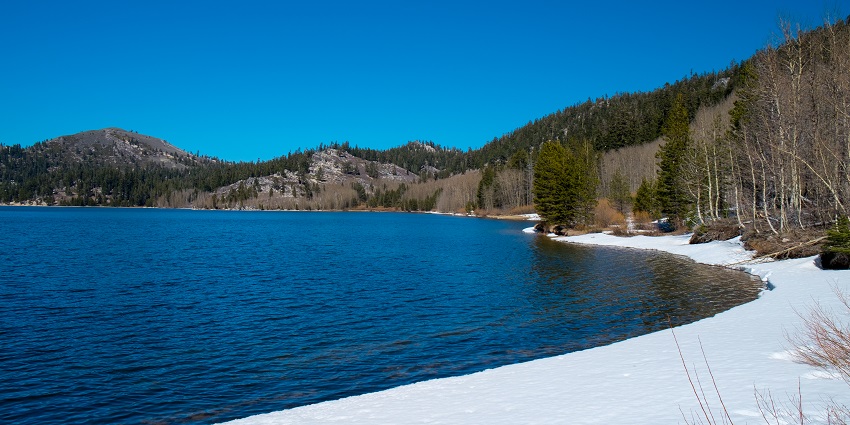 Peaceful view of Marlette Lake surrounded by forested hills near Carson City.