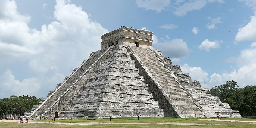 El Castillo pyramid at Chichen Itza, under a clear blue sky, one of the best places to visit near Cancun.