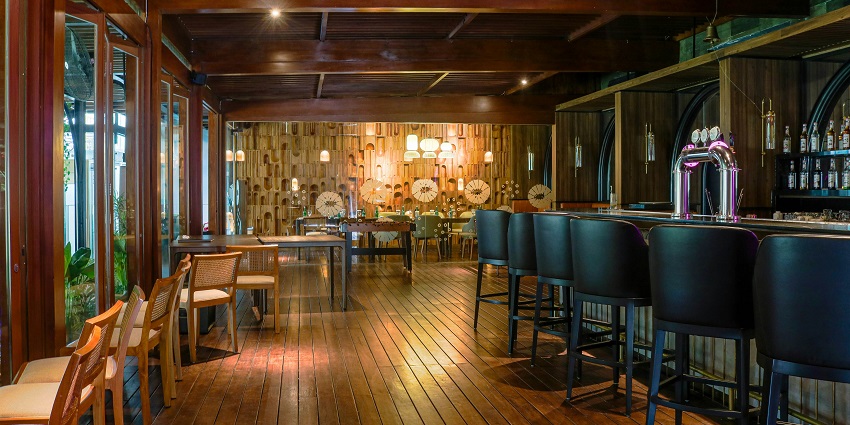 Colorful interior lighting and DJ setup at LXXY Bali, one of the best things to do in Kuta Bali at night.