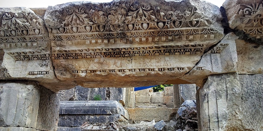 Rock-cut tombs at Myra are set into a rugged cliff, with detailed ancient carvings, among the places to visit near Antalya.