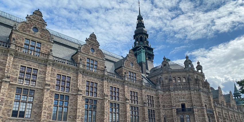 Falkenberg Museum with a traditional facade and many windows under a partly cloudy sky.