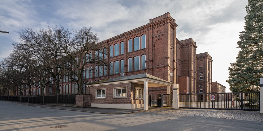 Spinnerei Art Galleries in Leipzig, housed in a former factory with a brick courtyard view.
