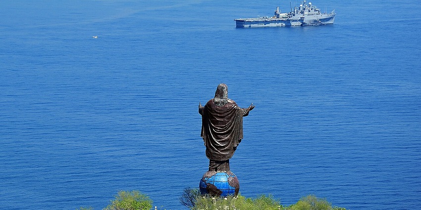 A bronze statue by the water in East Timor, one of the iconic places to visit near Australia.