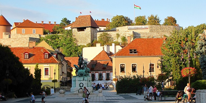 Eger Castle atop a hill with historic stone walls, one of the places to visit near Budapest.