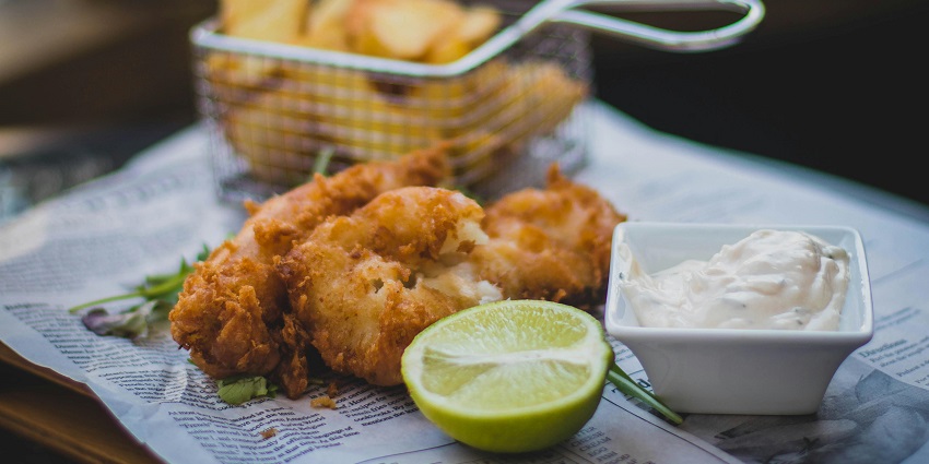 Fried fish served on a plate at a casual seafood spot near Milford Harbour.