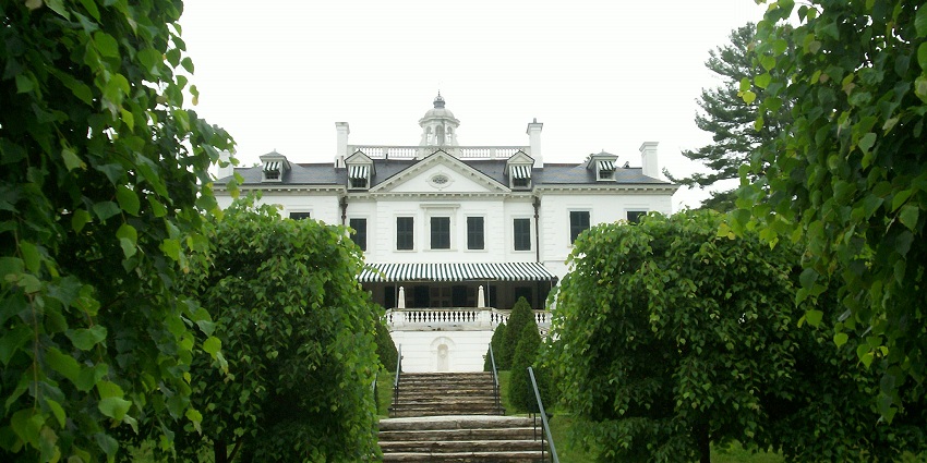 The mount from the front with a white architectural building and stairs leading to the building.
