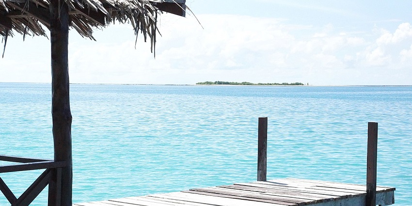 A view of the island with breathtaking beauty which is surrounded by deep blue ocean.