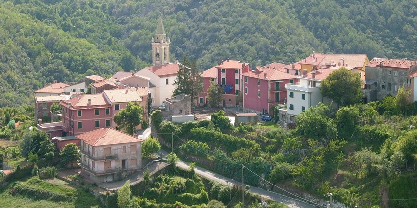 San Pietro Frascati and other distant structures surrounded by hills and dense greenery.