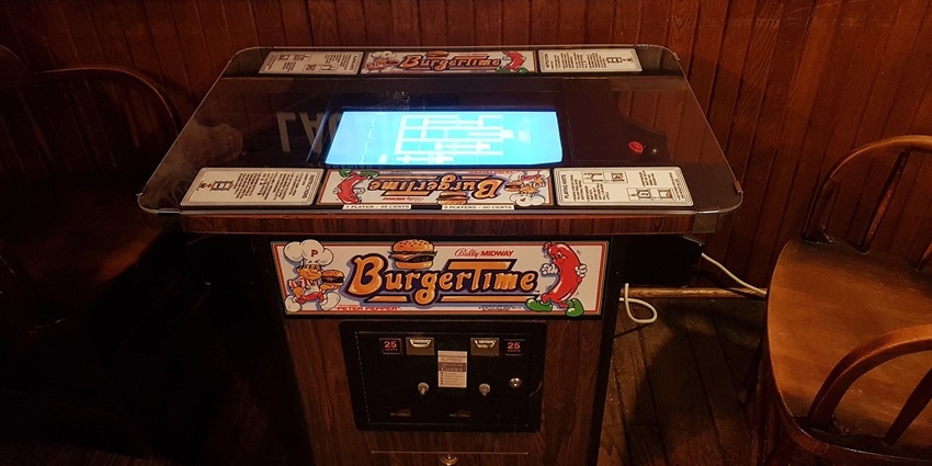 Guests play games inside Budapest’s GameUp Pub, one of the best things to do in Lynnwood.