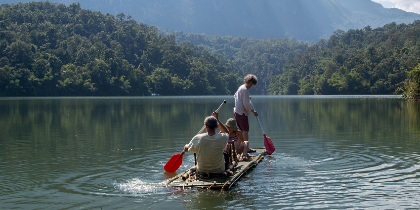 Enjoying calm bamboo rafting on the peaceful Pai River is a relaxing things to do in Pai.
