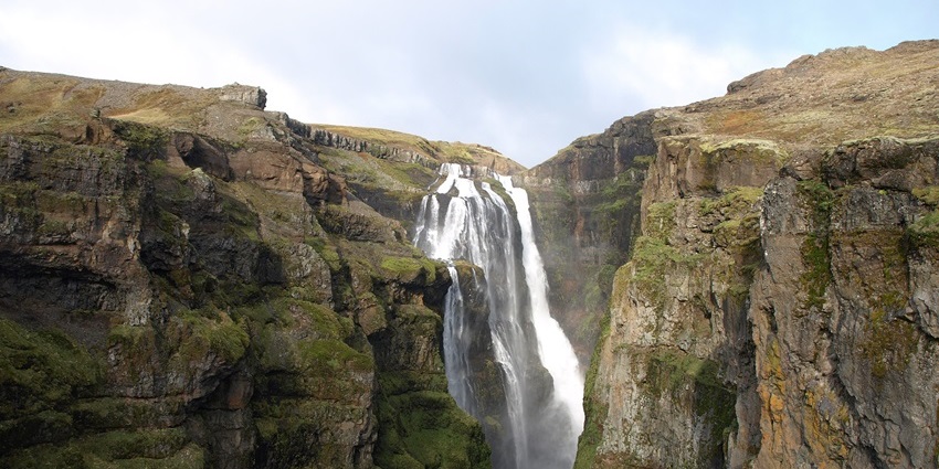 Hiking to Glymur waterfall is one of the most scenic things to do in Iceland in summer.