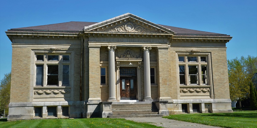 Exterior view of the Ellis County Historical Society building with clear skies.