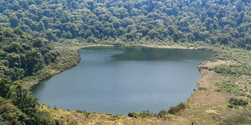 A panoramic view of Khecheopalri Lake, a sacred wish-fulfilling lake in West Sikkim