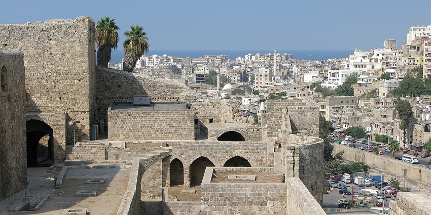The Citadel of Raymond de Saint-Gilles overlooks the skyline of Tripoli, one of the places to visit near Turkey.
