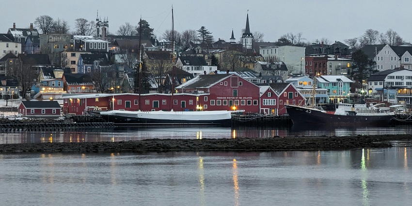 Lunenburg with multiple ships moored in front of the Fisheries Museum of Atlantic.