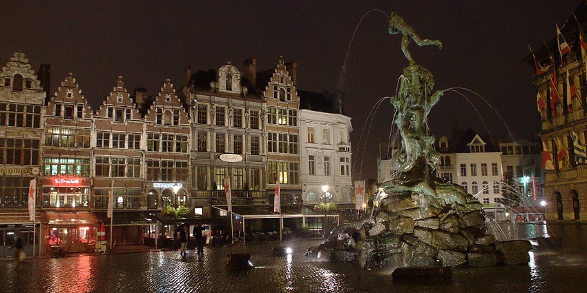 Grote Markt Square in Haarlem at night with multiple traditional architectural buildings.