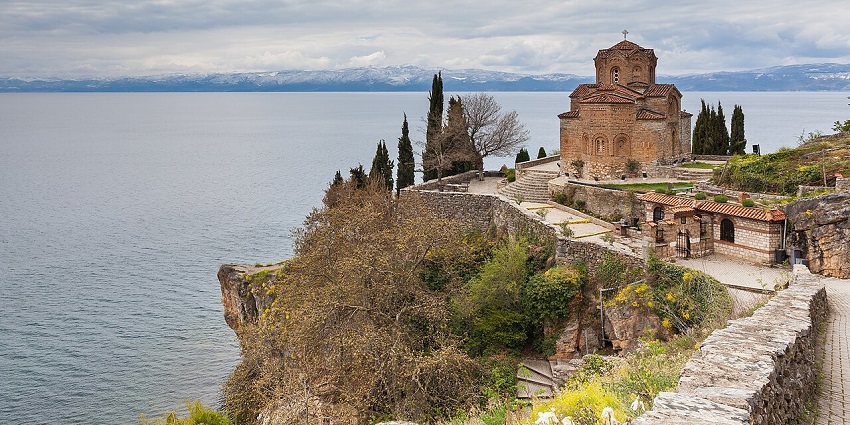 Church of St. John at Kaneo in Ohrid, North Macedonia, overlooking Lake Ohrid from a cliff.

