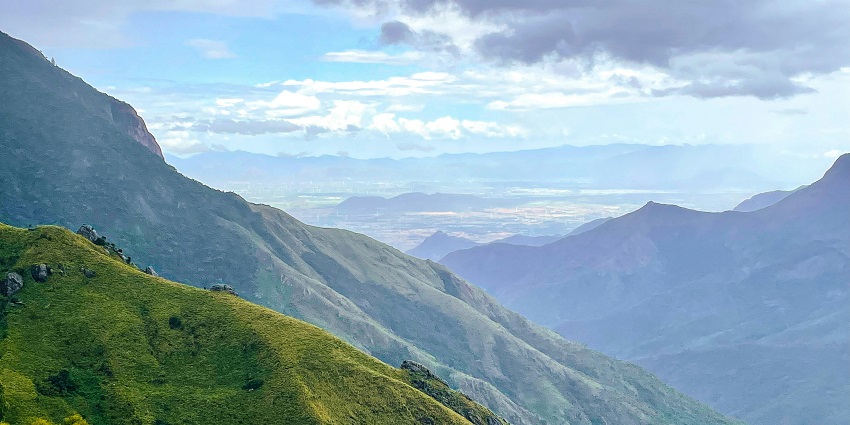 Scenic view of Panchgani with mountains in the background and lush green surroundings.
