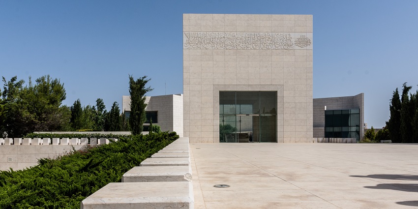 Exterior view of the Arafat Mausoleum surrounded by open space.