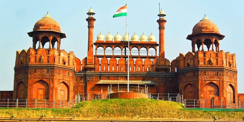 Red Fort is an iconic Mughal fort in Delhi, a UNESCO site known for its history and grand architecture.