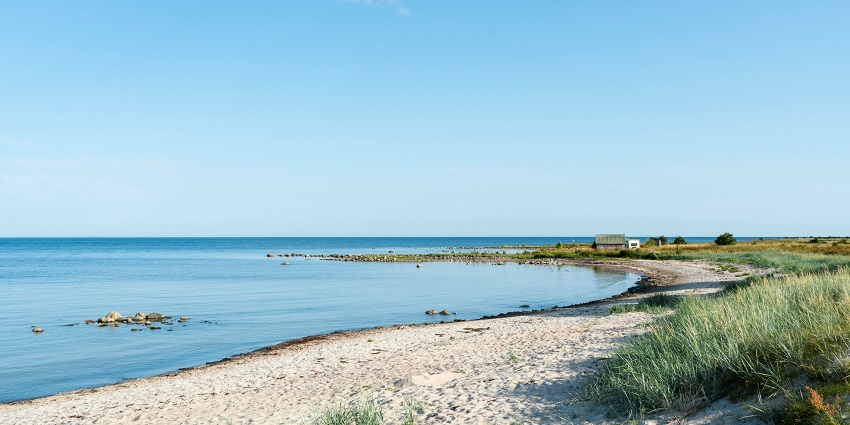 Skrea Strand Beach in Falkenberg, with its golden sand and calm waters, is one of the top things to do in Falkenberg, Sweden.