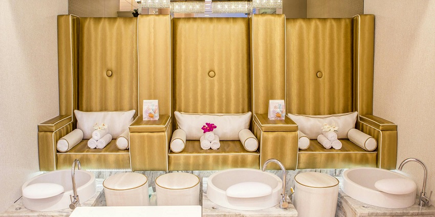 Spa at Amantaka resort in Luang Prabang, in warm lighting and wooden interior.