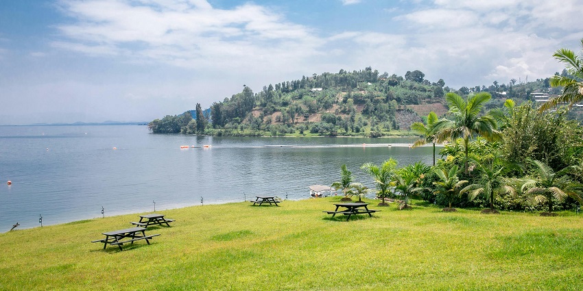 Lake Kivu beach in Rwanda along the calm lakeshore, one of the best places to visit near Kenya.