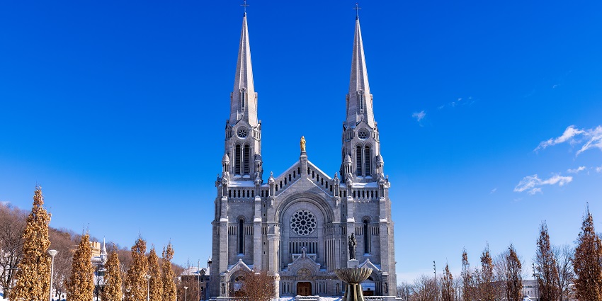 Sainte-Anne-de-Beaupré Basilica, with traditional Christian architecture and crosses on top of the church.