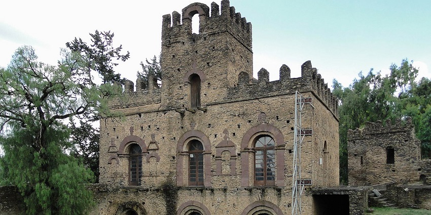 Mentewab’s Castle in Qusquam with traditional Ethiopian architecture and multiple windows.
