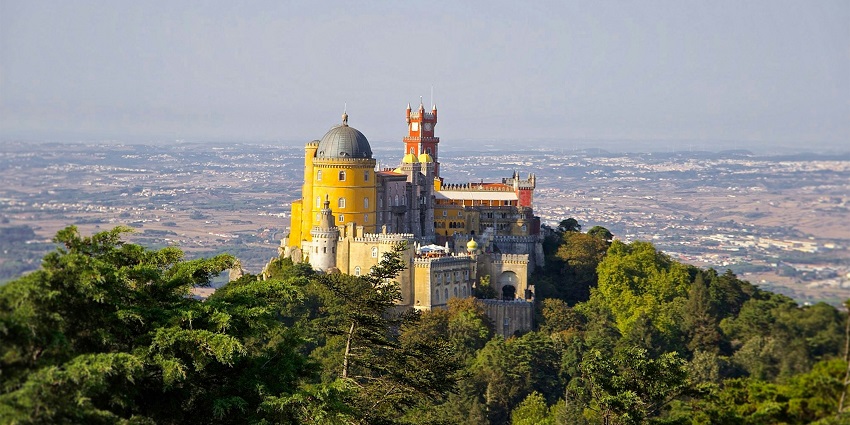 The colorful Palácio da Pena in Sintra, one of the top places to visit near Lisbon.