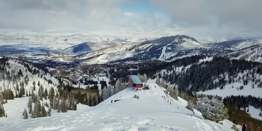 Echo Mountain Ski Resort base with ski lift towers and slopes is one of the best things to do in Denver Colorado in Winter.