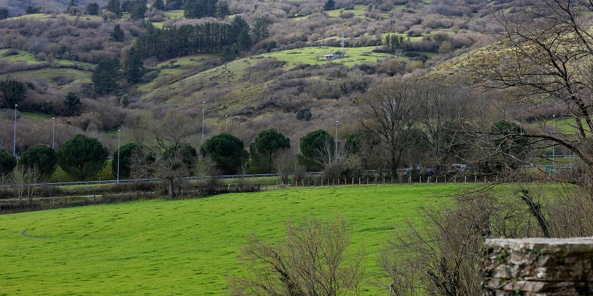 Scenic view of Spittal of Glenshee with winding roads, valleys, and mountain foothills.