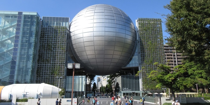 Exterior view of Nagoya City Science Museum with its iconic silver globe structure.