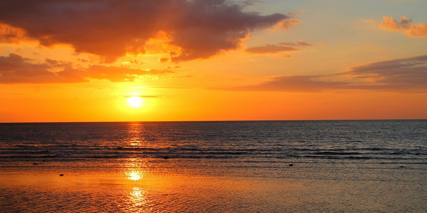 Watching the golden sunset is one of the most peaceful things to do in Lovina Beach.
