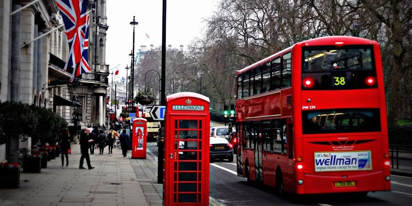Riding a red double-decker bus is one of the most scenic things to do in London on Christmas Day.