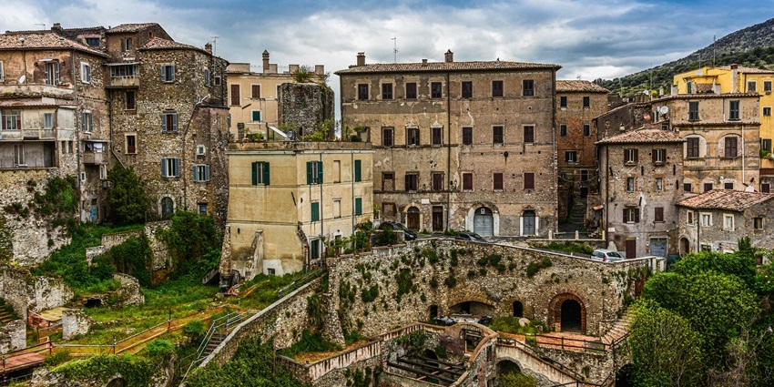 Tivoli with multiple staircases lush green trees and Italian architecture places to visit near Rome.