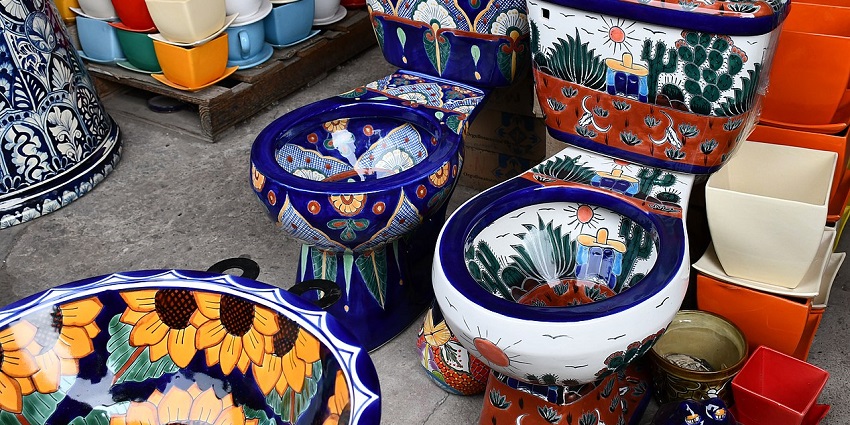Ceramic bowls are displayed in a Tonalá shop, one of the places to visit near Guadalajara.