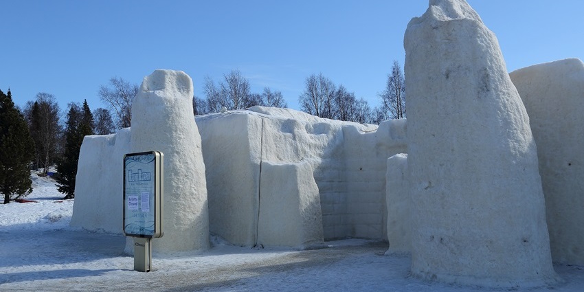Snowy facade of Lumilinna SnowCastle in Kemi featuring white walls and sculpted details.