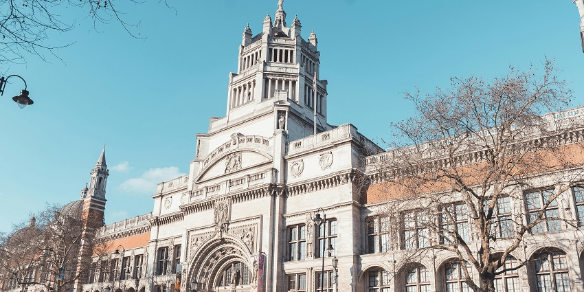 Exterior of the Victoria and Albert Museum featuring grand architecture and entrance.