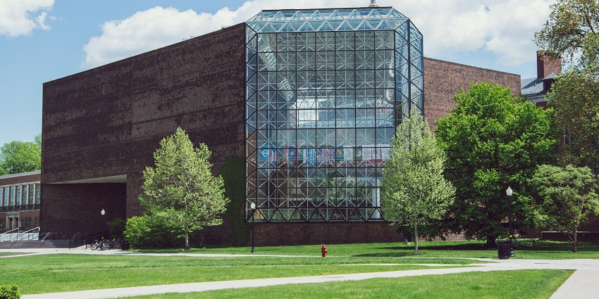 Exterior view of the Whitaker Center for Science and the Arts building under a clear sky.