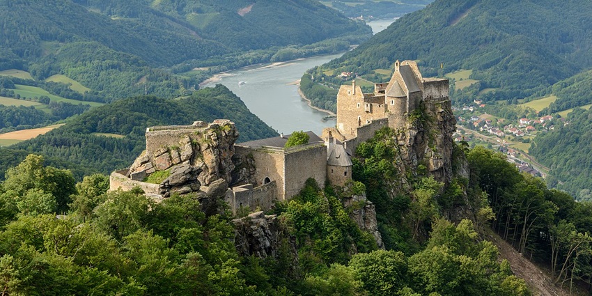 Wachau Valley with the ruins of the castle of Aggstein, a distant river flowing, one of the top places to visit near Vienna.