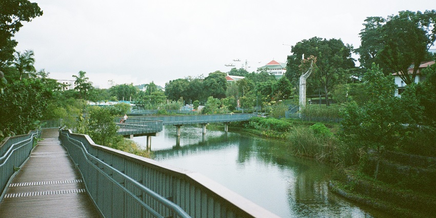 The Ätran River flows calmly between grassy banks, one of the things to do in Falkenberg Sweden.