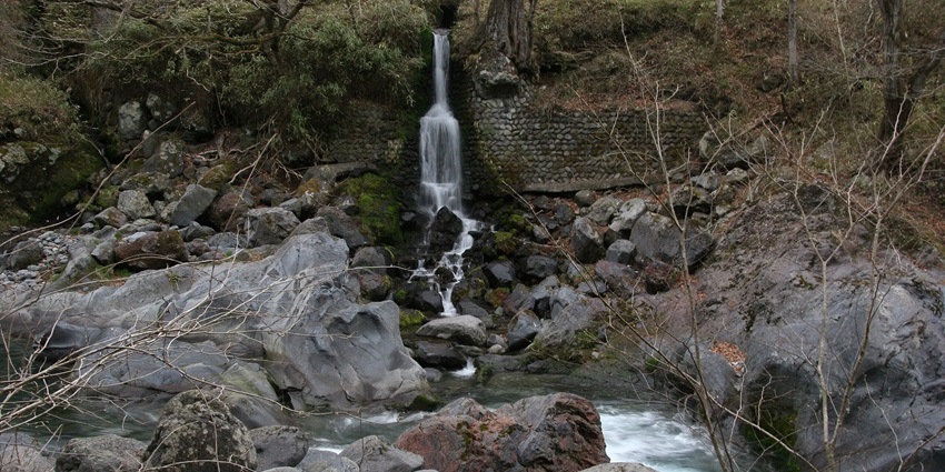 Discovering the tranquil Kanmangafuchi Abyss with its charming waterfalls, one of the best things to do in Nikko.