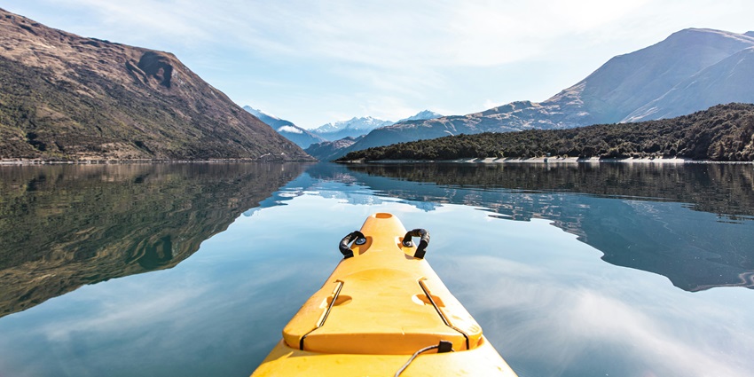 Lake Wanaka cliffs and reflections, among the scenic places to visit near Queenstown.