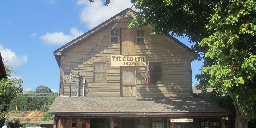 The old mill building with traditional architecture in the historic district.
