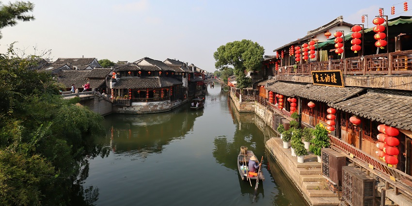 Xitang water town charming canals and ancient architecture, is amongst the top places to visit near Shanghai.