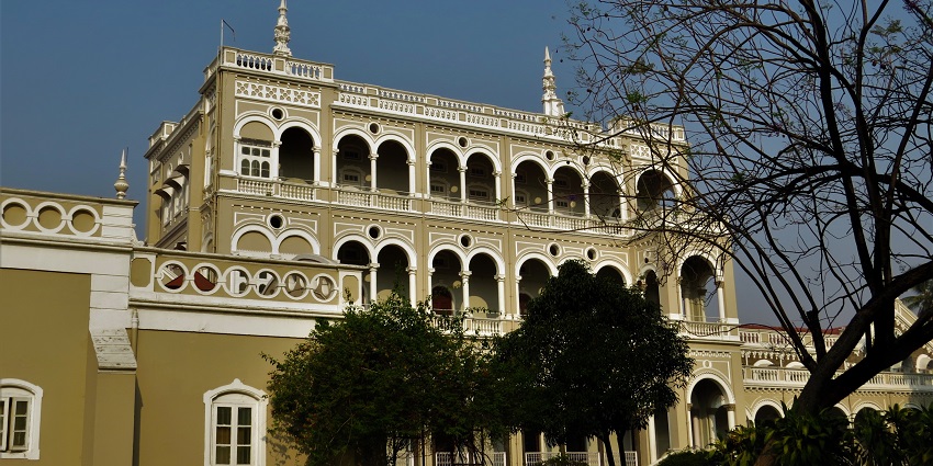 Beautiful facade of Aga Khan Palace in Pune, with arches and ornamental spires, one of the best places to visit near FC Road.