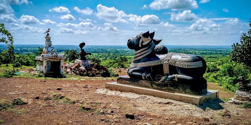 A sculpture of Nandi Ji overlooks the Shiva Temple perched atop Ananthagiri Hills.
