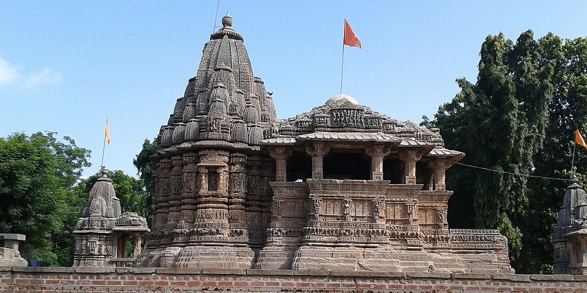 Beautifully carved sandstone Hindu temple with ornate pillars, one of the spiritual places to visit near Surat for 1 day.