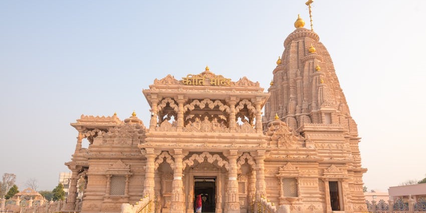 Radha Rani Temple, an ornate temple surrounded by a spiritual ambiance.
